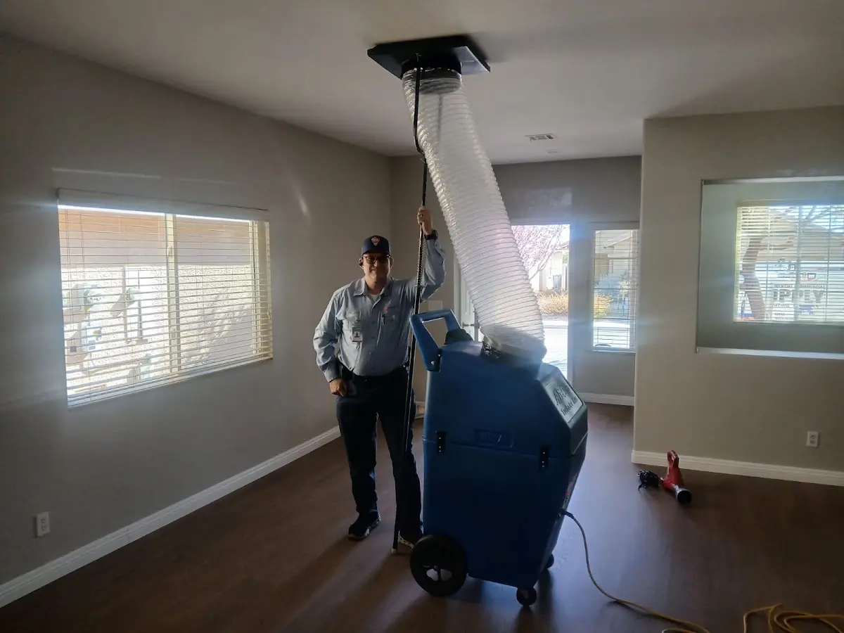 Professional Dryer Vent Cleaning work inside a De Soto home